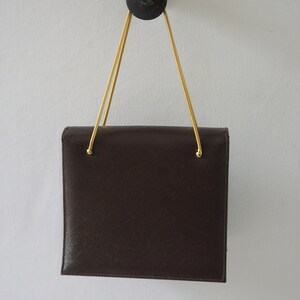 Bolso de mano vintage La France estilo acordeón con asa de cadena en tono dorado