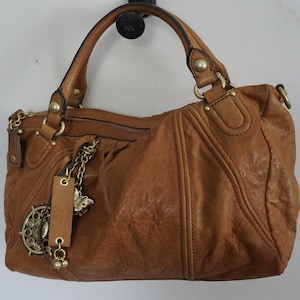 Bolsos y carteras marrones de Juicy Couture