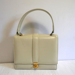 Bolsos y carteras vintage elegantes de piel color crema para mujer