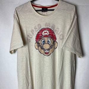 Maglietta vintage Y2K Nintendo Super Mario bianca Videogioco Film Cartone animato Taglia L SPEDIZIONE GRATUITA