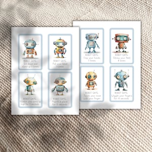 Pode incluir: Um conjunto de oito cartas ilustradas com rob&ocirc;s que t&ecirc;m diferentes instru&ccedil;&otilde;es para um jogo de rob&ocirc; diz. As cartas s&atilde;o impressas em cart&atilde;o branco com uma borda azul claro. Cada carta apresenta um rob&ocirc; diferente com uma instru&ccedil;&atilde;o &uacute;nica, como "bata palmas 5 vezes" ou "mexa os dedos por 10 segundos".