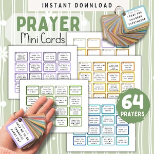 May include: A set of printable prayer mini cards featuring 64 individual prayers on small rectangular cards with colored borders. The cards are displayed on sheets and as a fan-shaped deck held together by a metal ring, with text including Dear God.