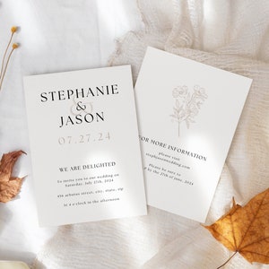 May include: Wedding invitation with a simple design featuring the names Stephanie & Jason, the date 07.27.24, and the text "We are delighted to invite you to our wedding on Saturday, July 27th, 2024 at 4 o'clock in the afternoon." The invitation also includes a website address for more information.