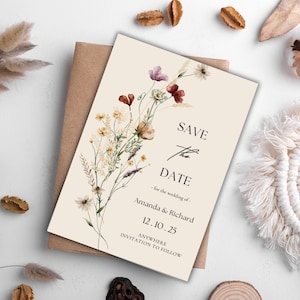 An image display of a captivating wildflower-themed wedding save the date template available for immediate digital download, empowering you to craft an unforgettable wedding announcement effortlessly.