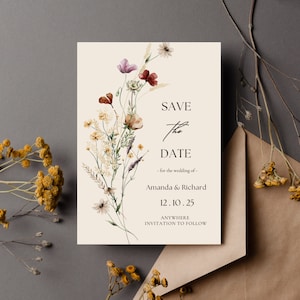 Capture the essence: A snapshot highlighting a meticulously crafted wildflower save the date wedding invite template ready for your personal editing and hassle-free printing on Canva, making your wedding preparations effortless and elegant.