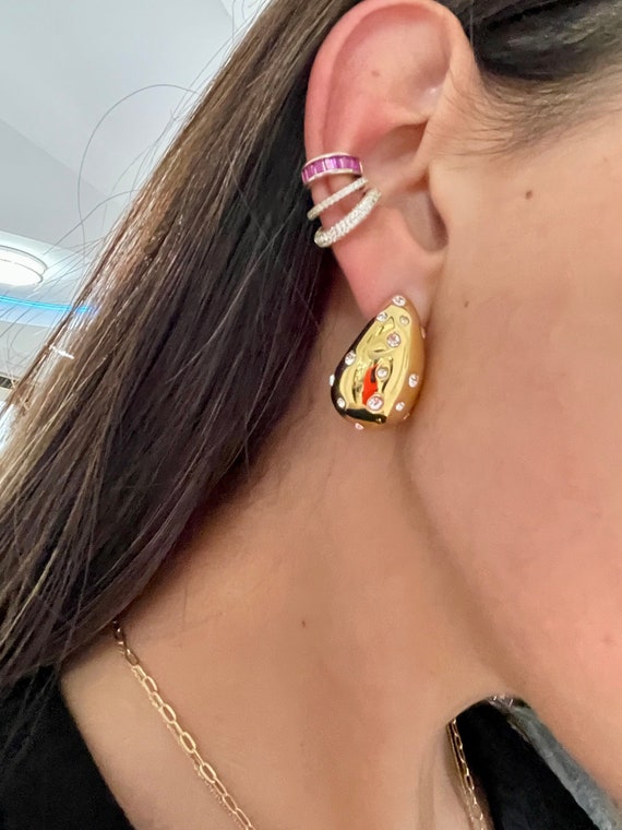 Gold claw earrings best sale