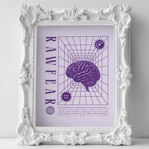 May include: A framed print with a white ornate frame. The print features a purple brain graphic, the word "RAWFEAR" in vertical text, and other text and graphics. The frame is white.