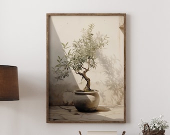 May include: A wooden dresser with six drawers and black handles. A framed print of a potted olive tree hangs above the dresser. A potted plant sits on the floor in front of the dresser. A brown rug is on the floor in front of the dresser.
