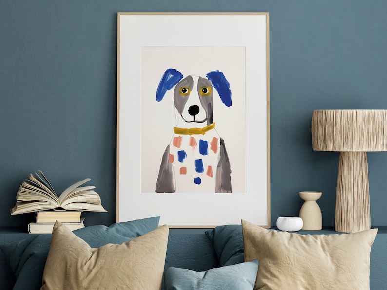 May include: A framed illustration of a dog with blue ears, a white and pink checked collar, and yellow eyes. The dog is painted in a simple, childlike style.