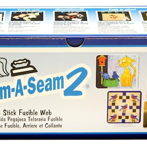 May include: A blue box with the text "Steam-A-Seam2" in white letters. The box also has the text "Double Stick Fusible Web" and "La Doble Espalda Pegajosa Telaraña Fusible" in black letters. The box has images of different sewing projects.