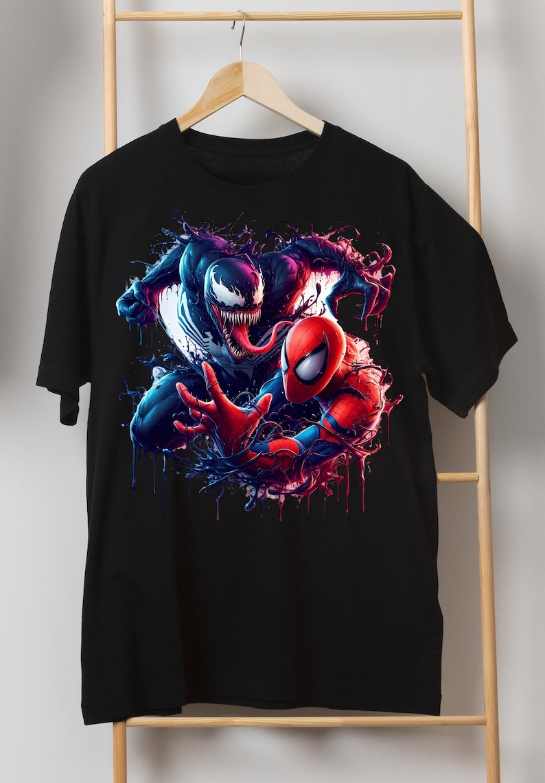 May include: Black t-shirt with a graphic print of Venom and Spider-Man in a battle pose. The graphic is in a vibrant blue, red, and black color scheme.