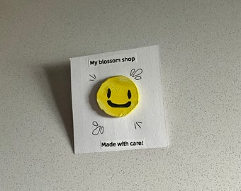 Happy face pin!