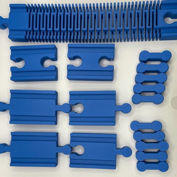 Value Pack of track connectors for Wooden Trains (17 pieces).  Many connection options. Compatible with Brio, Thomas the Train, and similar.