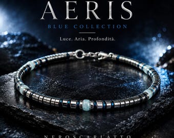 May include: A bracelet featuring alternating metallic silver-toned cylindrical beads, dark blue spacers, and light blue translucent beads. The text AERIS BLUE COLLECTION Luce. Aria. Profondità. NEROSCARLATTO gioielli per chi lascia il segno is visible.