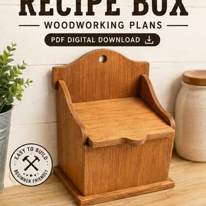 May include: A wooden recipe box with a hinged lid and a wall-mounting hole. The text reads: RECIPE BOX, WOODWORKING PLANS, PDF DIGITAL DOWNLOAD, EASY TO BUILD, BEGINNER FRIENDLY, STEP-BY-STEP INSTRUCTIONS, DETAILED DIAGRAMS, MATERIALS & CUT LIST, INSTANT DOWNLOAD.