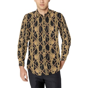 May include: A long-sleeved button-down shirt featuring a black base colour with a repeating gold-toned chain link pattern arranged in a diamond grid layout. The shirt has a standard collar, a front button placket, and long sleeves with buttoned cuffs.