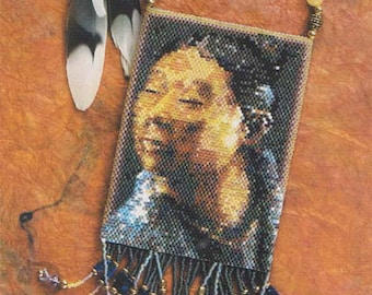 May include: A beaded necklace with a portrait of a woman in a beaded frame. The necklace has a fringe of beads and a small ceramic angel charm.