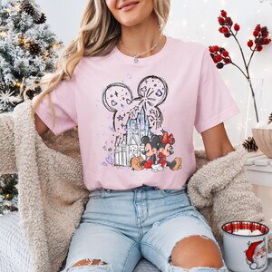 May include: A handmade wooden sign with the text "Welcome to our home" in a handwritten style. The sign is painted white with a dark stained frame. A small, decorative heart is in the bottom right corner.