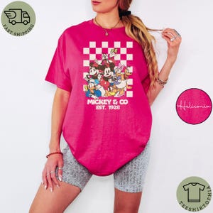 May include: A set of three ceramic mugs with a speckled, matte finish. The mugs are in shades of cream, light gray, and dark gray. Each mug has a simple, minimalist design, perfect for coffee or tea.