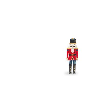 May include: A decorative nutcracker figurine in a classic soldier design. The figurine is painted with a red jacket, black hat, and blue pants. The nutcracker has a white mustache and is standing upright.