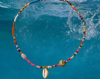 Colorful pearl necklace with cowrie shell, charms and natural freshwater pearls, shell gold, shell necklace