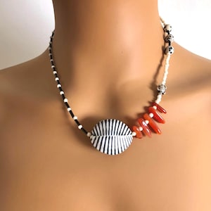 Black and white shell necklace with large zebra shell, carnelian, turtle silver and Dalmatian jasper beads