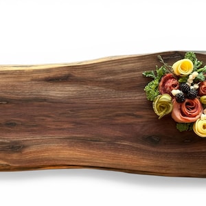Handcrafted walnut charcuterie board with minimal styling, modern kitchen gift, real estate closing gift idea, visual of beautiful live edge