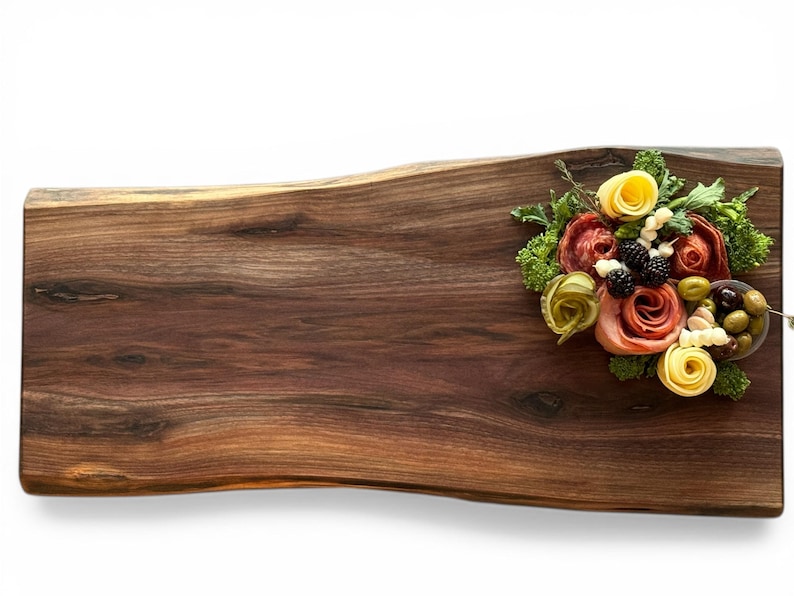 Handcrafted walnut charcuterie board with minimal styling, modern kitchen gift, real estate closing gift idea, visual of beautiful live edge