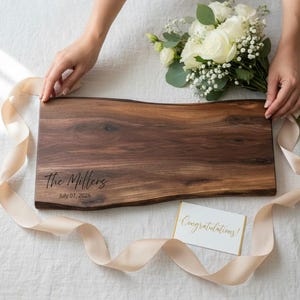 Personalized cutting board gift wrapped, suggestive wedding gift for couple and ideal real estate closing gift or housewarming gift