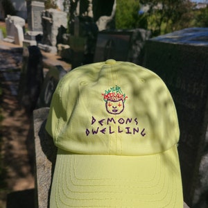 Demons Dwelling Hand-Embroidered Dad Hat
