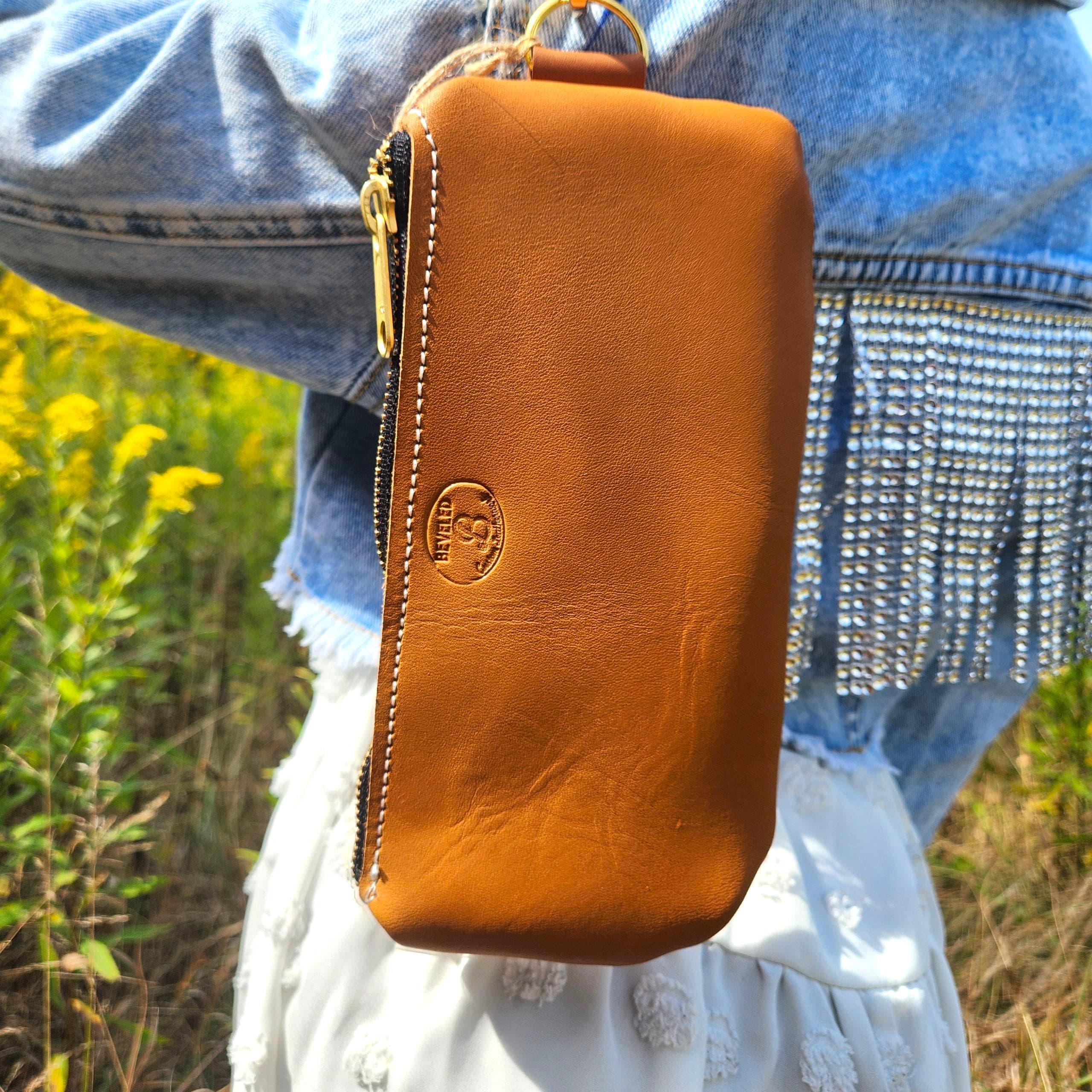 The BE wristlet- handmade leather wristlet. Perfect for an evening bag or use as a wallet & pair with a tote!