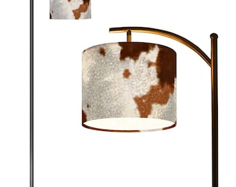 Cowhide Arc Floor Lamp (Made in USA).  Matching rug available (not actual cowhide)