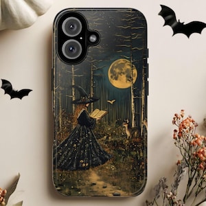May include: A black smartphone case featuring a printed illustration of a figure in a pointed hat and long dark dress reading a book in a forest at night. The scene includes a large yellow full moon, tall trees, and a small deer in the woods.