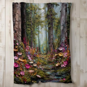 May include: A forest-themed blanket featuring a vibrant painting of a forest path. The artwork showcases tall trees, colorful flowers, and a sense of depth. The color palette includes greens, pinks, yellows, and browns, creating a natural and inviting scene.