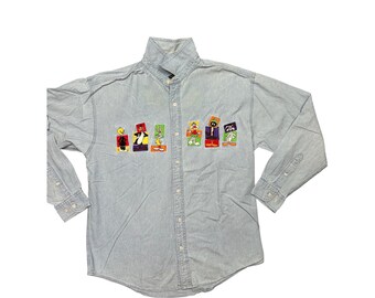 Camisa vaquera vintage de la tienda de los estudios Warner Bros. con bordado de Looney Tunes, talla L.