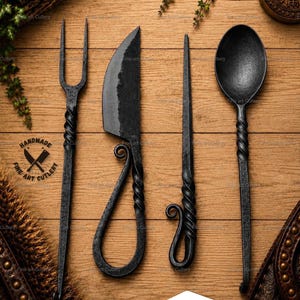 May include: A set of four black forged metal utensils including a two-pronged fork, a curved blade knife, a thin pointed skewer, and a round spoon. Each piece features a twisted handle design. A logo with the text Handmade Fine Art Cutlery is visible.