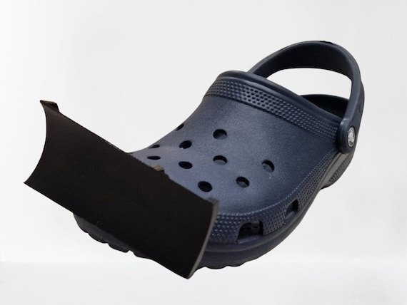 These Croc Snow Plow Attachments Help You Wear Your Crocs Through