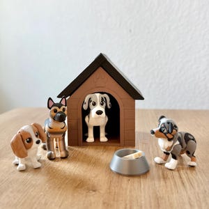 May include: A dog-themed playset featuring four toy dogs, a dog house, and a food bowl with a bone. The dogs are various breeds, including a Dalmatian, a German Shepherd, and a Beagle. The dog house is brown with a paw print.