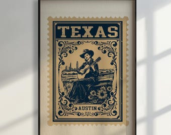 May include: Framed vintage-style print featuring a blue and tan design of a woman playing a guitar, with the word "TEXAS" at the top. The print is in a black frame and is hanging on a white wall. The word "AUSTIN" is at the bottom.