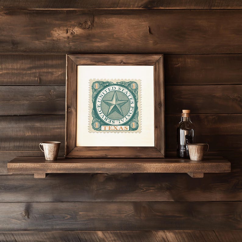 May include: A framed print of a vintage United States Postal Service stamp with a blue star and the words 'United States Postal Service Texas'.