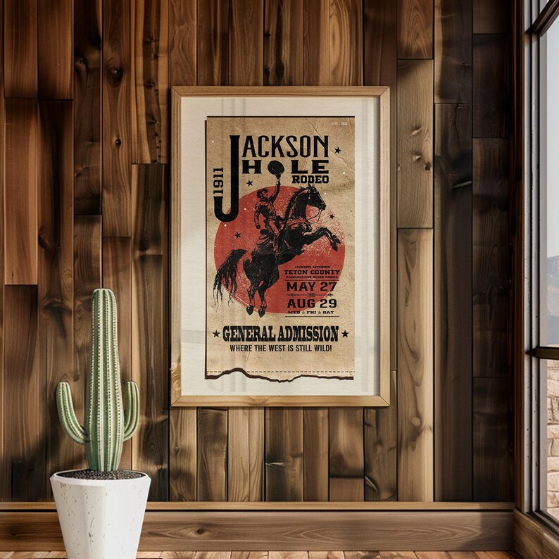 May include: A vintage poster advertising the Jackson Hole Rodeo in Teton County, Wyoming. The poster features a cowboy riding a bucking bronco with a red sun in the background. The dates of the rodeo are May 27th to August 29th. The text on the poster reads "Jackson Hole Rodeo, Teton County, Wyoming, May 27 - Aug 29, General Admission, Where the West is Still Wild!"