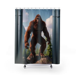 May include: A brown Bigfoot stands on a rock in a forest setting. The Bigfoot is looking directly at the viewer. The background is a blurry forest with a blue sky.