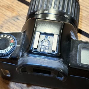 Canon EOS Rebel 35-80mm SLR Film Camera w/ 80-200 mm Zoom includes Lens, Flash, Bag, Straps