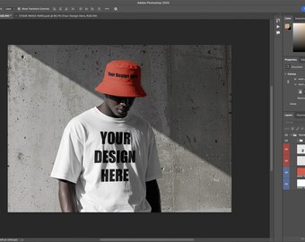T-Shirt & Bucket Hat Mockup PSD — Urban Wall Shadow Scene