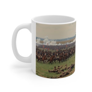 May include: A white ceramic mug with a scene of a Civil War battle printed on it. The scene shows soldiers on horseback charging into battle, with smoke and dust in the air. There are fallen soldiers in the foreground.
