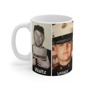 May include: White ceramic mug with a black and white photo of a man with a name tag that says "Waltz" on the left side and a color photo of a man in a military uniform with a name tag that says "Vance" on the right side.