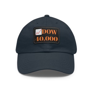 May include: A navy blue baseball cap with a patch that says "DOW 40,000" and features a red line graph.