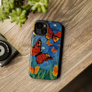May include: A phone case with a blue background and a swirling pattern. There are five butterflies on the case, two are orange and red, and three are yellow. The case has a black border.
