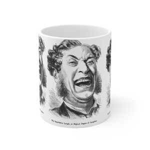 Puede incluir: Taza de cerámica blanca con una ilustración en blanco y negro de un hombre riendo. La taza tiene el texto "The Superlative Laugh, or Highest Degree of Laughter" impreso. El diseño envuelve la taza.