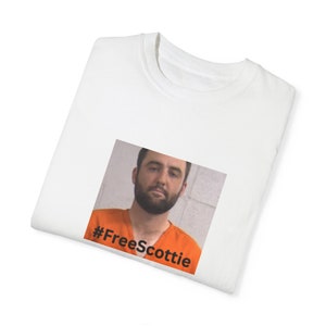 Stückgefärbtes Unisex-T-Shirt. KOSTENLOSES SCOTTIE-HEMD Bild 9